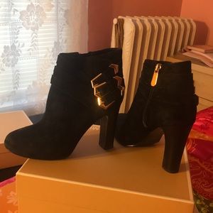 Leather and suede heel bootie with gold buckle